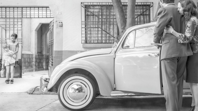 man and woman with car